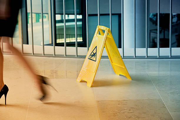 istock A yellow sign warning of a slippery floor 150953573