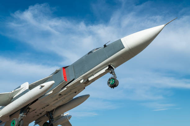 istock combat aircraft fighter bomber on a blue sky background 1509554846