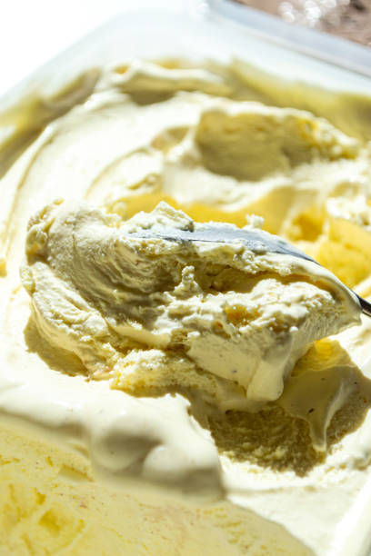 istock Sweet vanilla ice cream scooped up with a spoon 1509576433