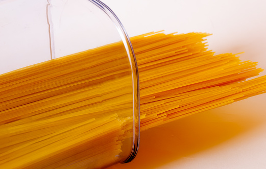 Pasta being removed from its container