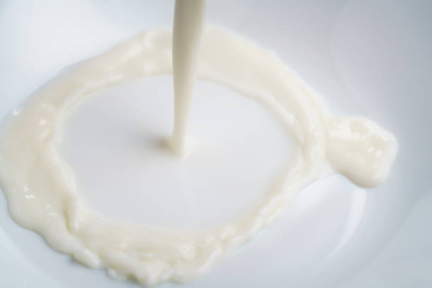 istock pouring milk into bowl from above 1509592845