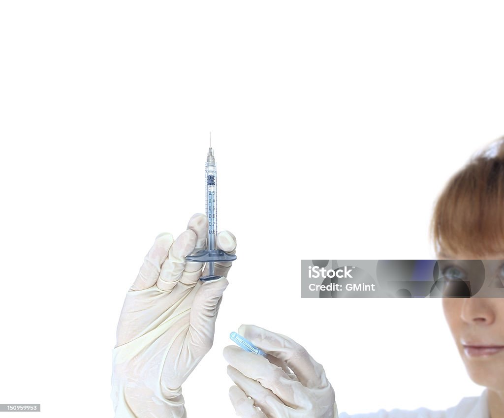 Mano, tenere la siringa per l'iniezione di bellezza products.Hyaluronic acido iniezioni - Foto stock royalty-free di Apparecchiatura medica