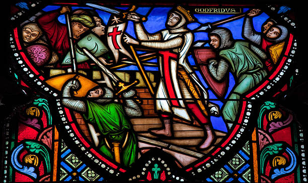 First Crusade - Siege of Jerusalem Godfrey of Bouillon (1060 – July 1100) was a medieval Frankish knight who was one of the leaders of the First Crusade from 1096 until his death. This stained glass window in the cathedral of Brussels depicts the Siege of Jerusalem by the Crusaders in the 11th Century. This window was created in 1866, no property release is required. historical palestine photos stock pictures, royalty-free photos & images