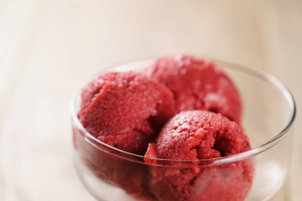istock raspberry sorbet ice cream balls on wooden table 1509692255