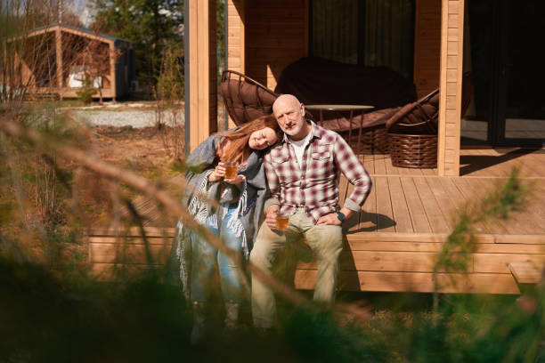 istock Mature couple drinking tea on cottage veranda 1509701492