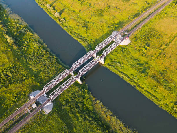 railway bridge over the river - railway bridge imagens e fotografias de stock