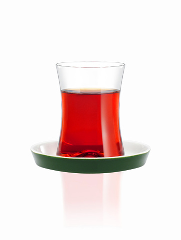 A glass of tea on white background with clipping path