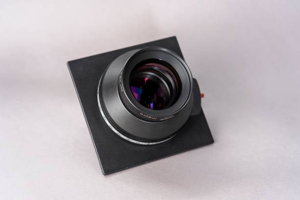 istock Closeup of a camera lens on a white background 1509748782