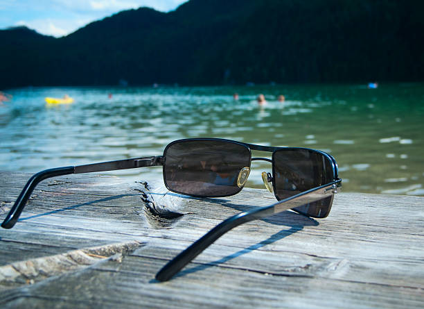 istock sunglasses by the lake 150975001