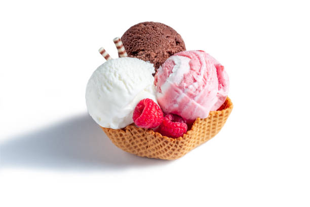 istock Three scoops of ice cream: white, brown and pink in a waffle glass on a white background. 1509779579