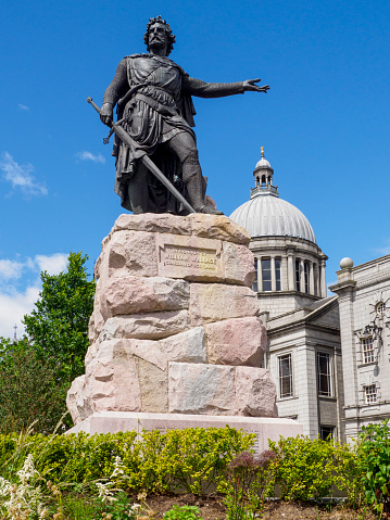 Bronze statue of William Wallace, the Scottish independence hero, on Rosemount Viaduct, Aberdeen, overlooking Union Terrace Gardens with the dome of St. Mark's Church in the background.
The statue was erected in 1888 and depicts Sir William Wallace dressed in classical garb. It was sculpted by William Grant Stevenson (1849-1919).