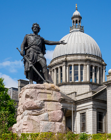 Atlanta, USA - April 20, 2018: Exterior state capitol building in Georgia with green park, statue of Civil War Governor Joseph E. Brown and Wife