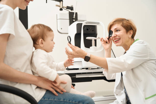 istock Ophthalmologist performing vision screening in child at initial consultation 1509855253