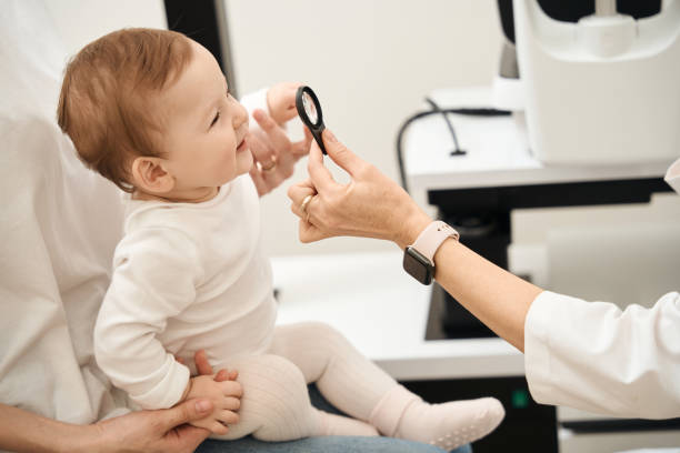 istock Pediatric oculist checking child vision during consultation 1509855255