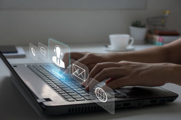 istock Technical Support Center Customer Service Internet Business Technology Concept. Closeup of hands typing on laptop. 1509866318