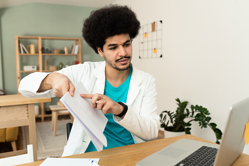 Doctor talking with colleagues through a video call