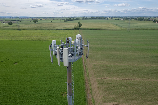5G Cell Towers on countryside rural background in Italy