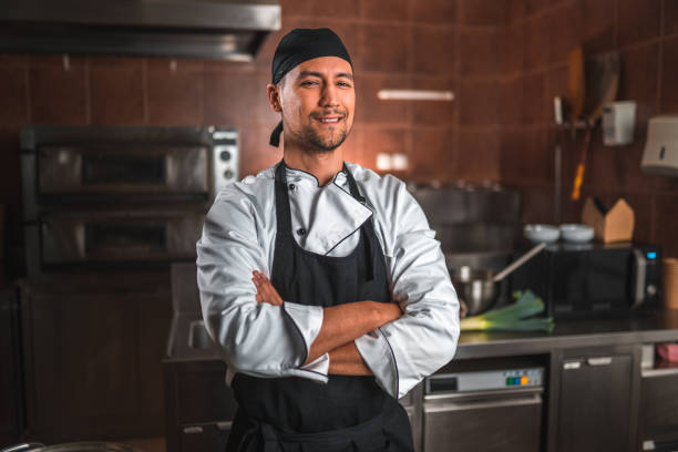 istock Male Chef Smiling with Arms Crossed 1510005643