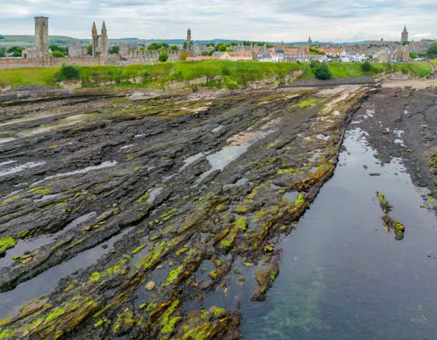 Drone view of St. Andrews, Fife Scotland with St. Andrews Cathedral ruins.