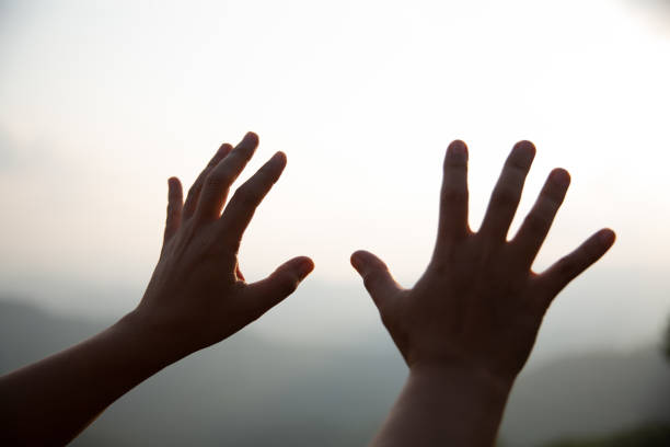 istock Human hands open palm up worship. Eucharist Therapy Bless God Helping Repent Catholic Easter Lent Mind Pray. Christian Religion concept background. fighting and victory for god 1510016625