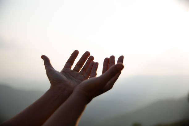istock Human hands open palm up worship. Eucharist Therapy Bless God Helping Repent Catholic Easter Lent Mind Pray. Christian Religion concept background. fighting and victory for god 1510017150