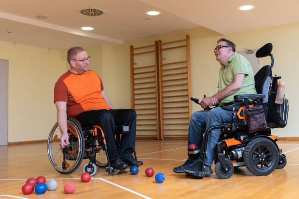 istock Two disabled friends trained dystrophy boccia together. 1510018361