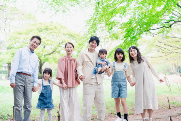 istock A three-generation family smiling in nature 1510090168