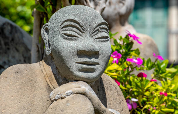 istock Statue in a Zen garden at a Buddhist temple 1510102014