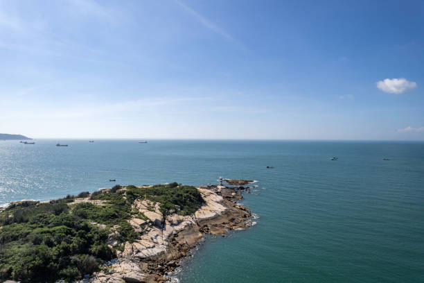 istock Reefs and lighthouse on sunny island 1510112938
