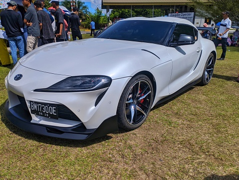 Pekanbaru, Indonesia - 05-28-2023: White Toyota GR Supra showed off at the Pekanbaru Indonesia