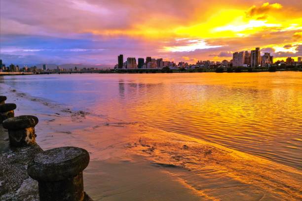 istock Riverbank Sunset at Dadaochen Wharf, Taipei Taiwan 1510193884