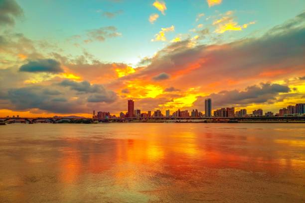 istock Riverbank Sunset at Dadaochen Wharf, Taipei Taiwan 1510197976