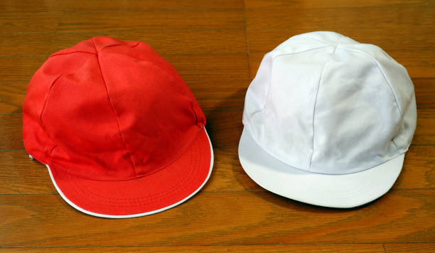 istock red and white reversible hats worn by Japanese elementary school students in physical education classes (called kouhakubo in Japan) 1510220445