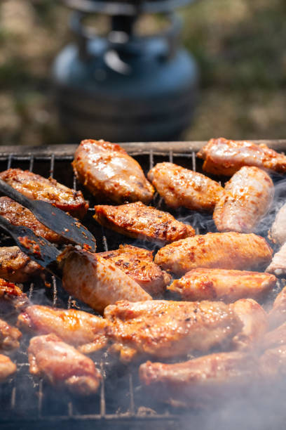 istock Chicken Grilled On Hot Barbecue Charcoal Flaming. 1510264863