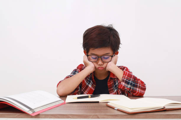 istock Stressed asian student studying with frown face expression. Isolated on white background 1510274957