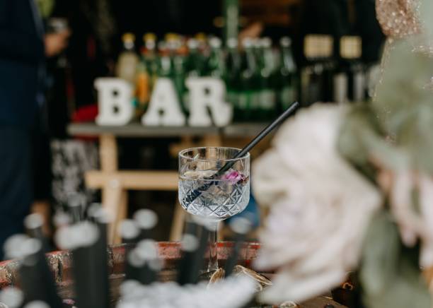 istock Crystal-clear gin and tonic sitting on table in a modern wedding venue 1510287464