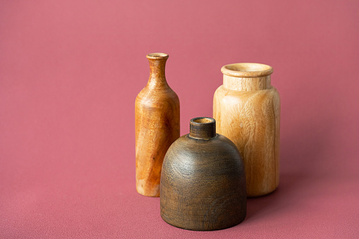 Empty handcraft wooden vases. Minimalistic still life.