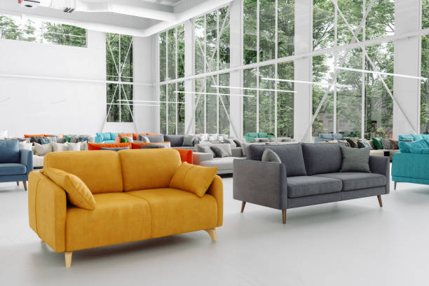 furniture store with different sofas and garden view through the window - furniture store furniture retail textile imagens e fotografias de stock