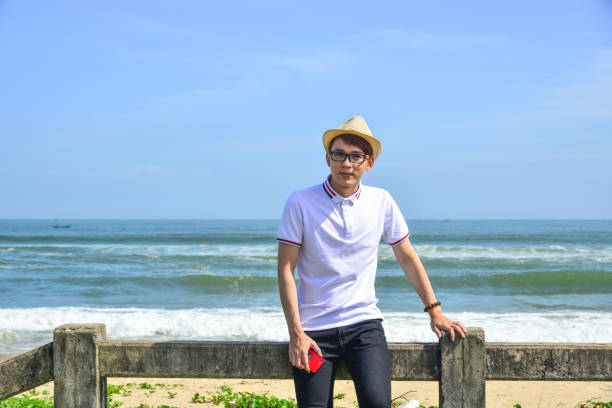 istock A young man enjoying the blue sea 1510402272