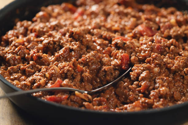 istock preparing lasagna process with bolognese sauce in pan 1510459671