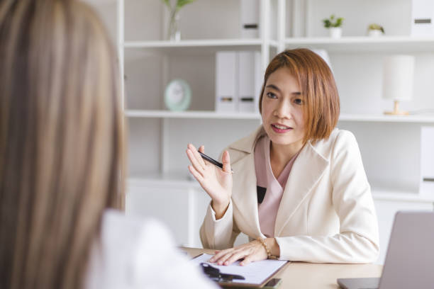 istock Confident woman human resource interviewing a job candidate in her office. 1510495403