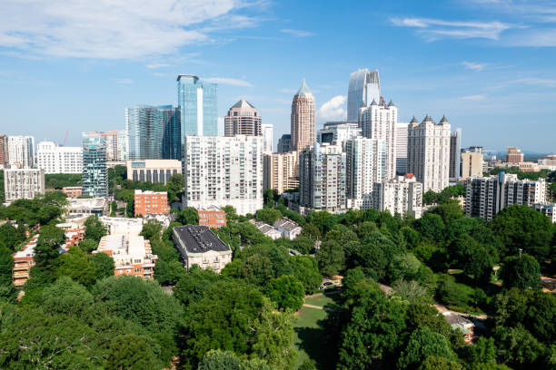 Downtown Atlanta on a sunny day from Piedmont Park Downtown Atlanta on a sunny day from Piedmont Park, Georgia, USA atlanta skyline stock pictures, royalty-free photos & images