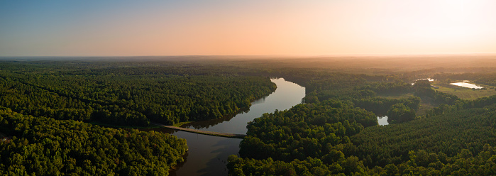 Sunrise over lush Alabama forest and lakelands, Alabama, USA