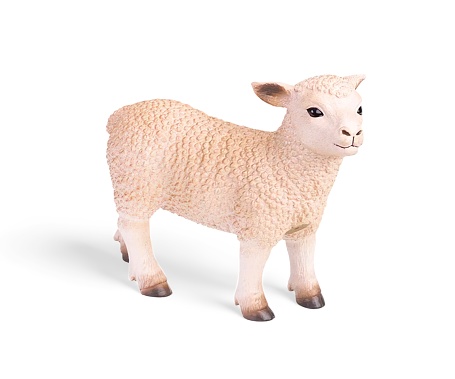 Miniature sheep animal toy isolated on white