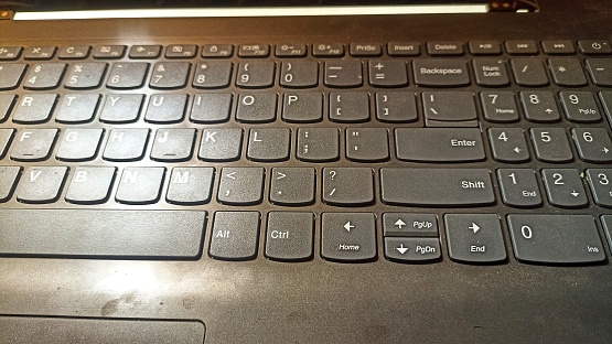 Laptop keyboard. Office laptop. Laptop keyboard toned