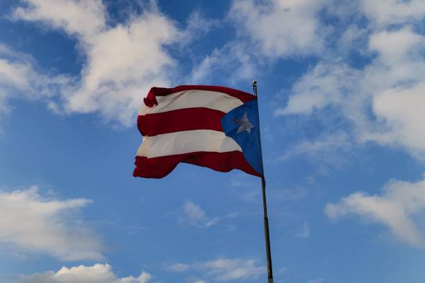 istock a american flag flying in the sky with a sky background 1510548288