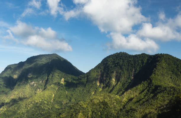istock Clouds drifting over the ridge of tropical mountains 1510586787