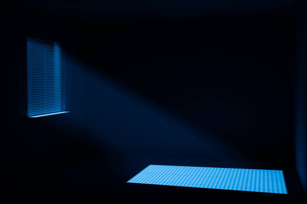 Moonlight from the window Moonlight on the floor through a window with horizontal blinds. dark window blinds stock pictures, royalty-free photos & images