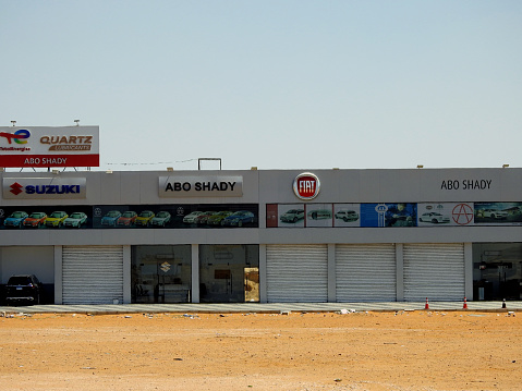 Stay In Your Car At All Times Road Warning Sign at Etosha National Park in Kunene Region, Namibia