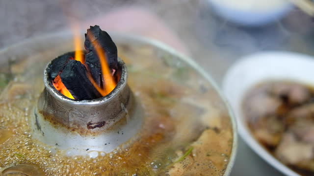Thai style stainless steel hot pot with flame